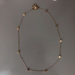 Long gold necklace